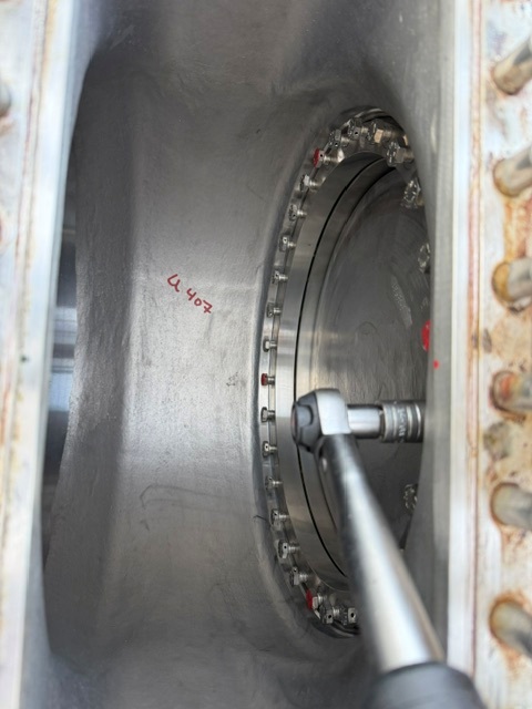 Close-up of a KSB Amri valve seal bore and flange bolts