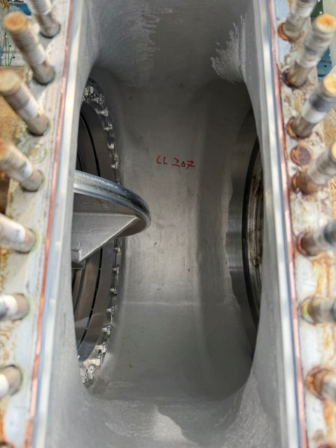 Close-up inside a KSB Amri valve body showing the sealing surface